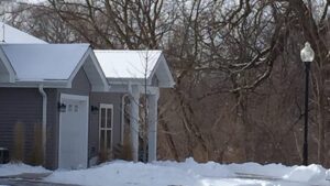 Advanced Electric LLC winter job at a Wisconsin home with garage lighting and an outdoor lamp post emergency electrician